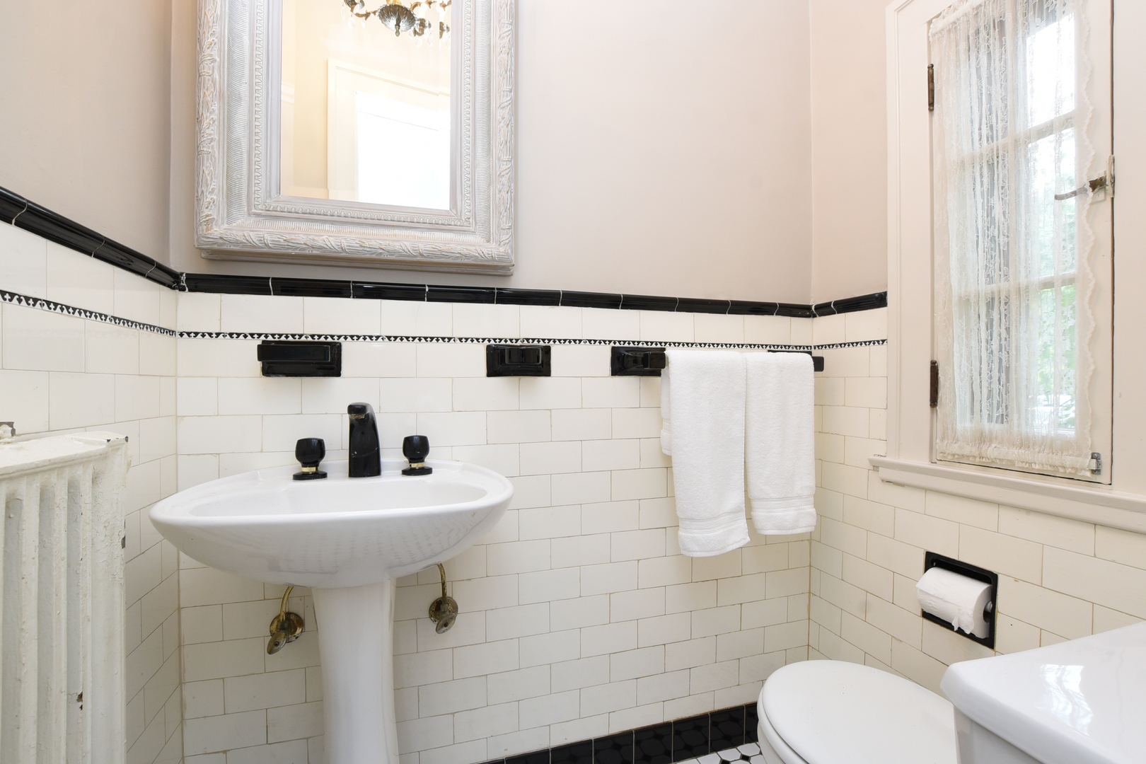 95 Michaux Road Riverside, IL 60546 - Photo 23 of 48 a bathroom with a sink toilet and mirror