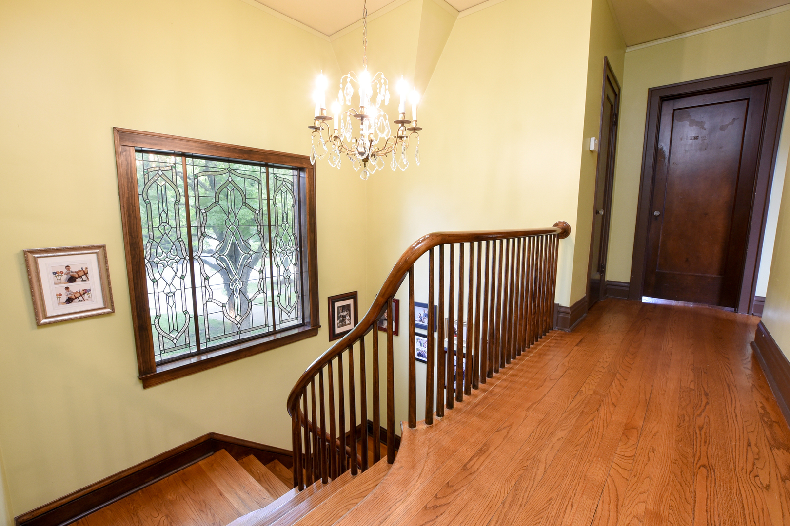 95 Michaux Road Riverside, IL 60546 - Photo 26 of 48 a view of a hallway with wooden floor and stairs