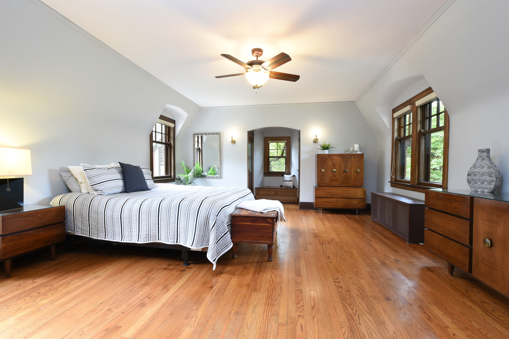 95 Michaux Road Riverside, IL 60546 - Photo 28 of 48 a bedroom with a large bed and a chandelier