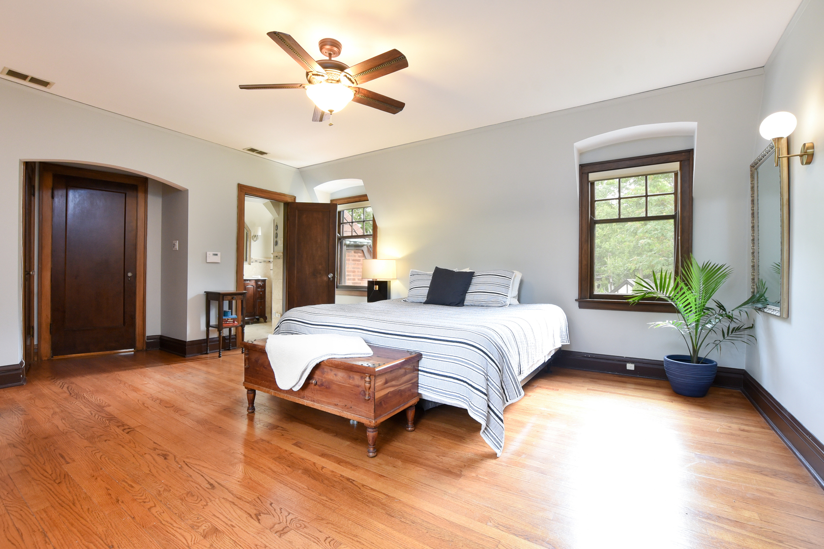 95 Michaux Road Riverside, IL 60546 - Photo 31 of 48 a bedroom with a balcony a bed and a potted plant
