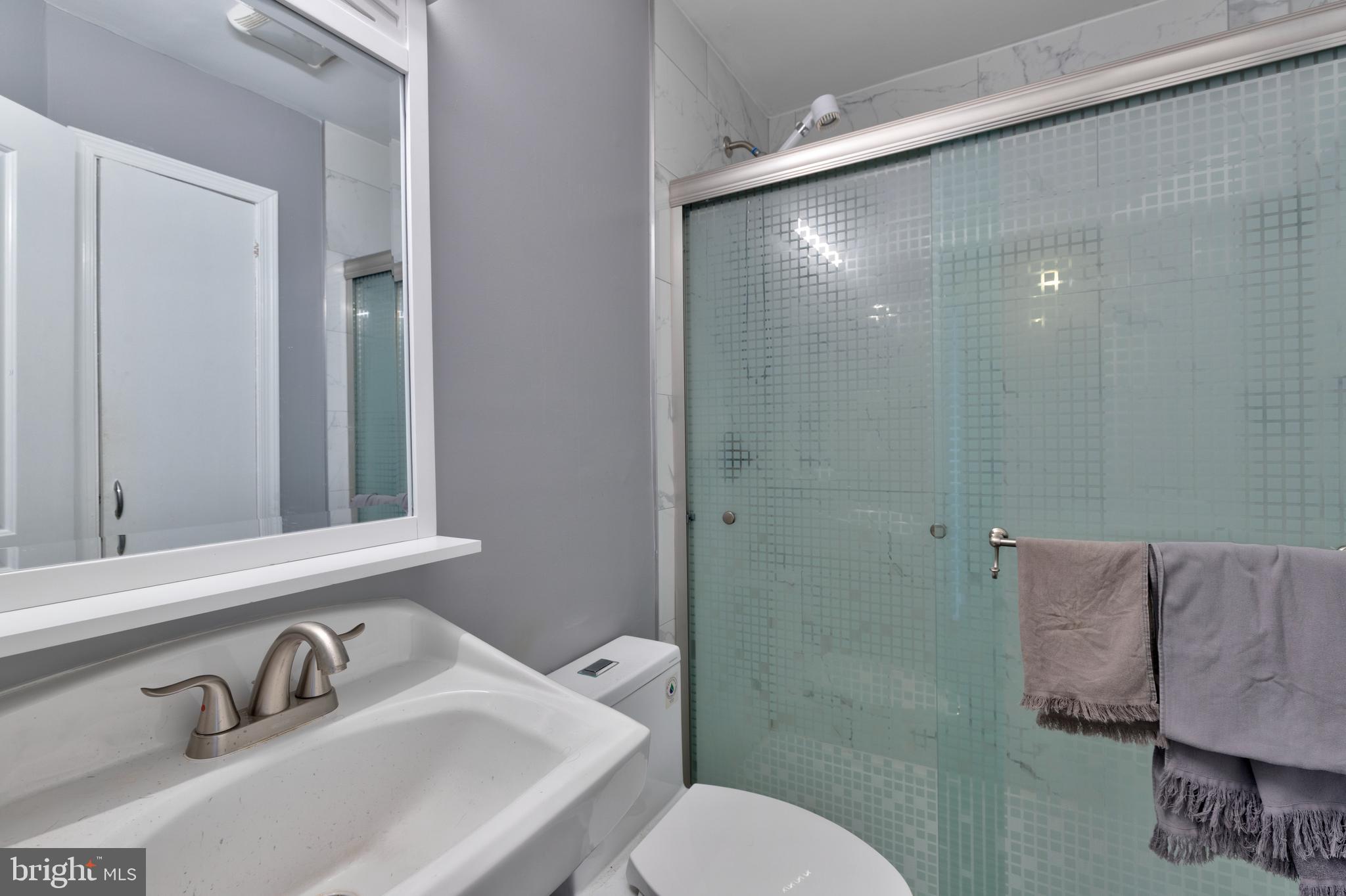 7817 St Fabian Lane Baltimore, MD 21222 - Photo 11 of 17 a bathroom with a sink and a mirror