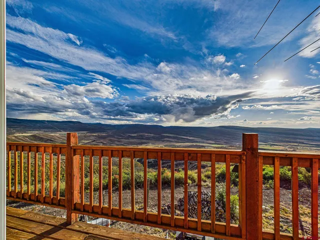 a room with musical instruments and wooden floor