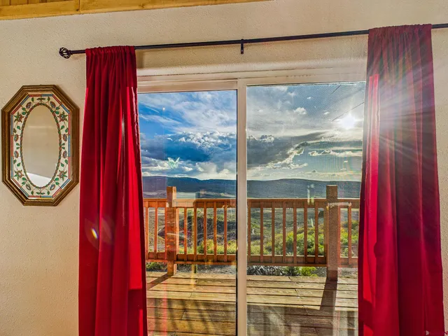 a room with furniture and a flat screen tv