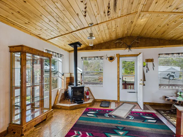 a bathroom with a toilet and shower