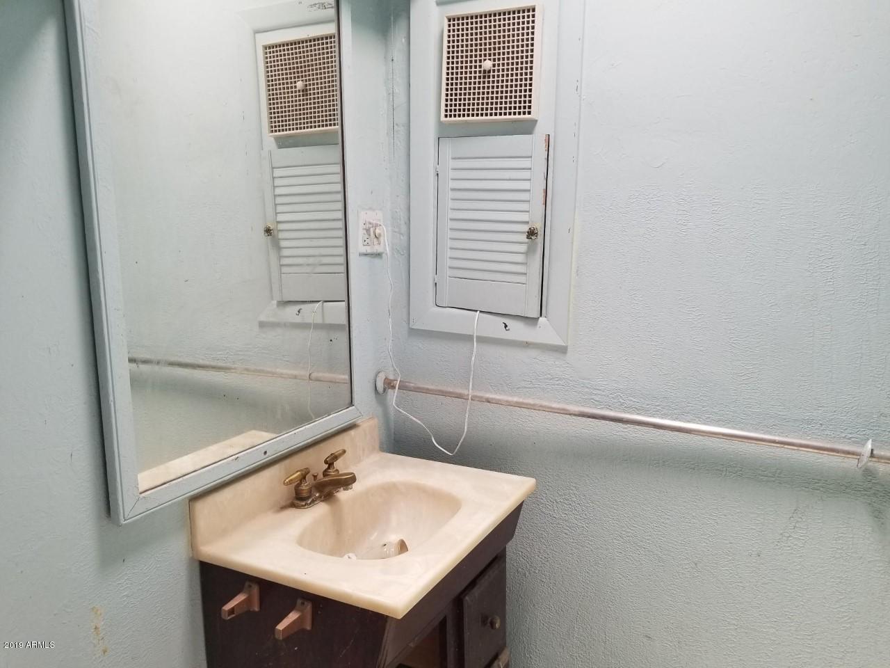 201 East 16th Street Douglas, AZ 85607 - Photo 13 of 34 201 16th 2nd bathroom sink