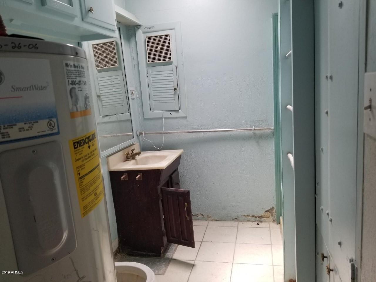 201 East 16th Street Douglas, AZ 85607 - Photo 15 of 34 201 16th water heater in bahroom