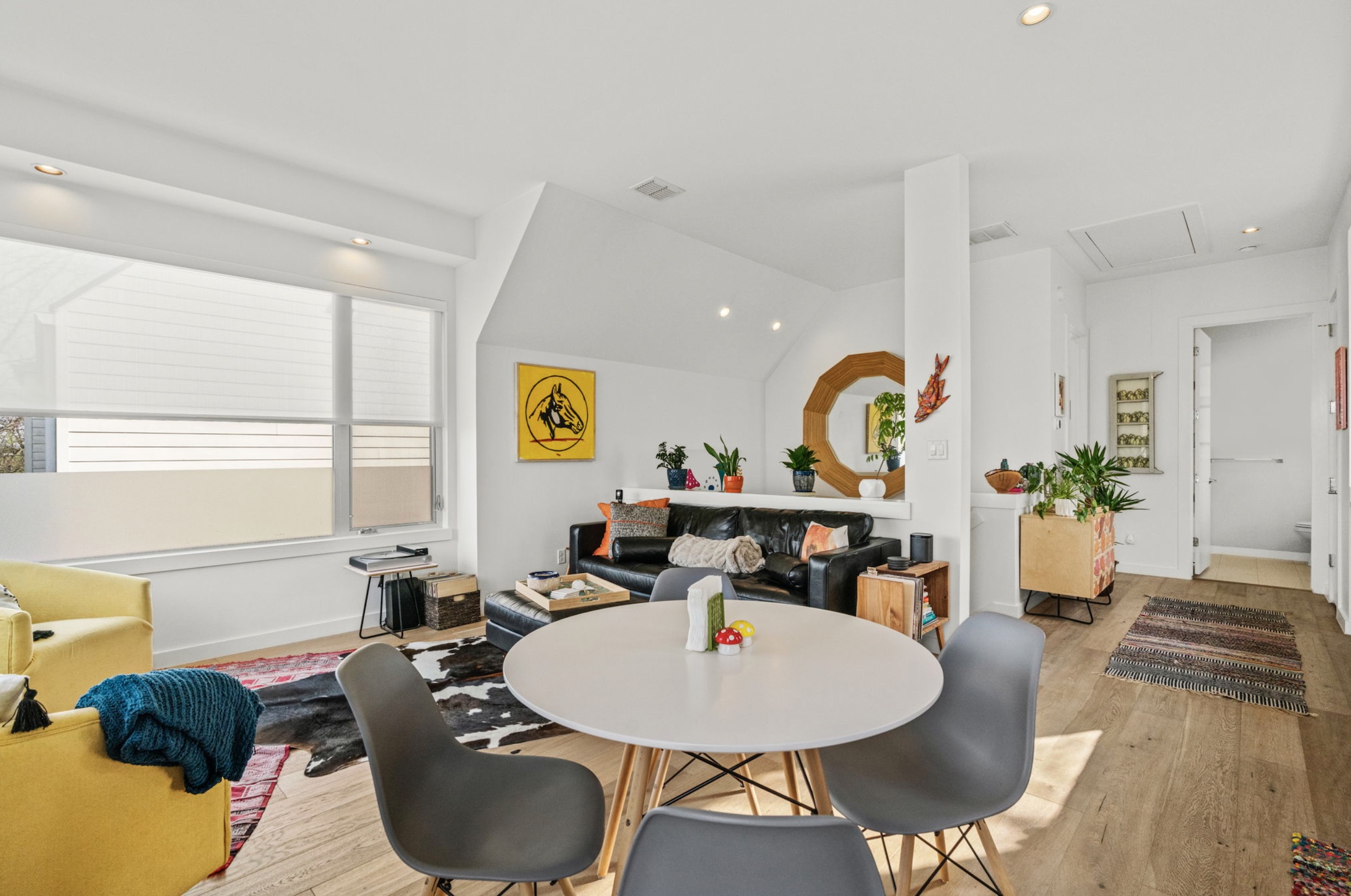 1608 Ravey Street, Unit B Austin, TX 78704 - Photo 13 of 25 Dining area featuring recessed lighting, light wood-style floors, and vaulted ceiling