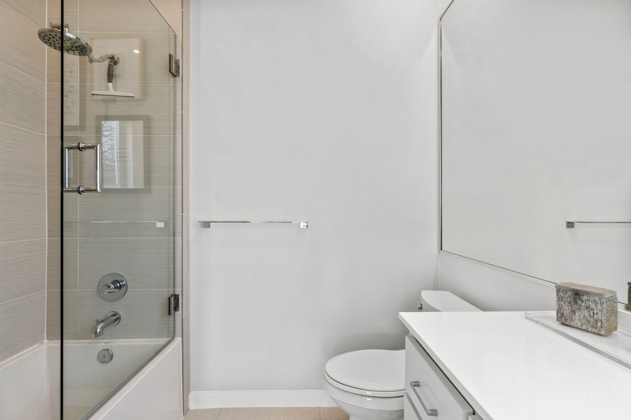 1608 Ravey Street, Unit B Austin, TX 78704 - Photo 18 of 25 Full bathroom with vanity and bath / shower combo with glass door