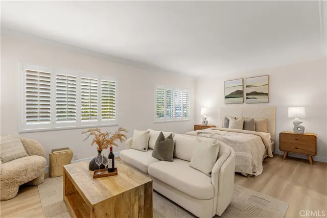 a bed room with a bed and a couch