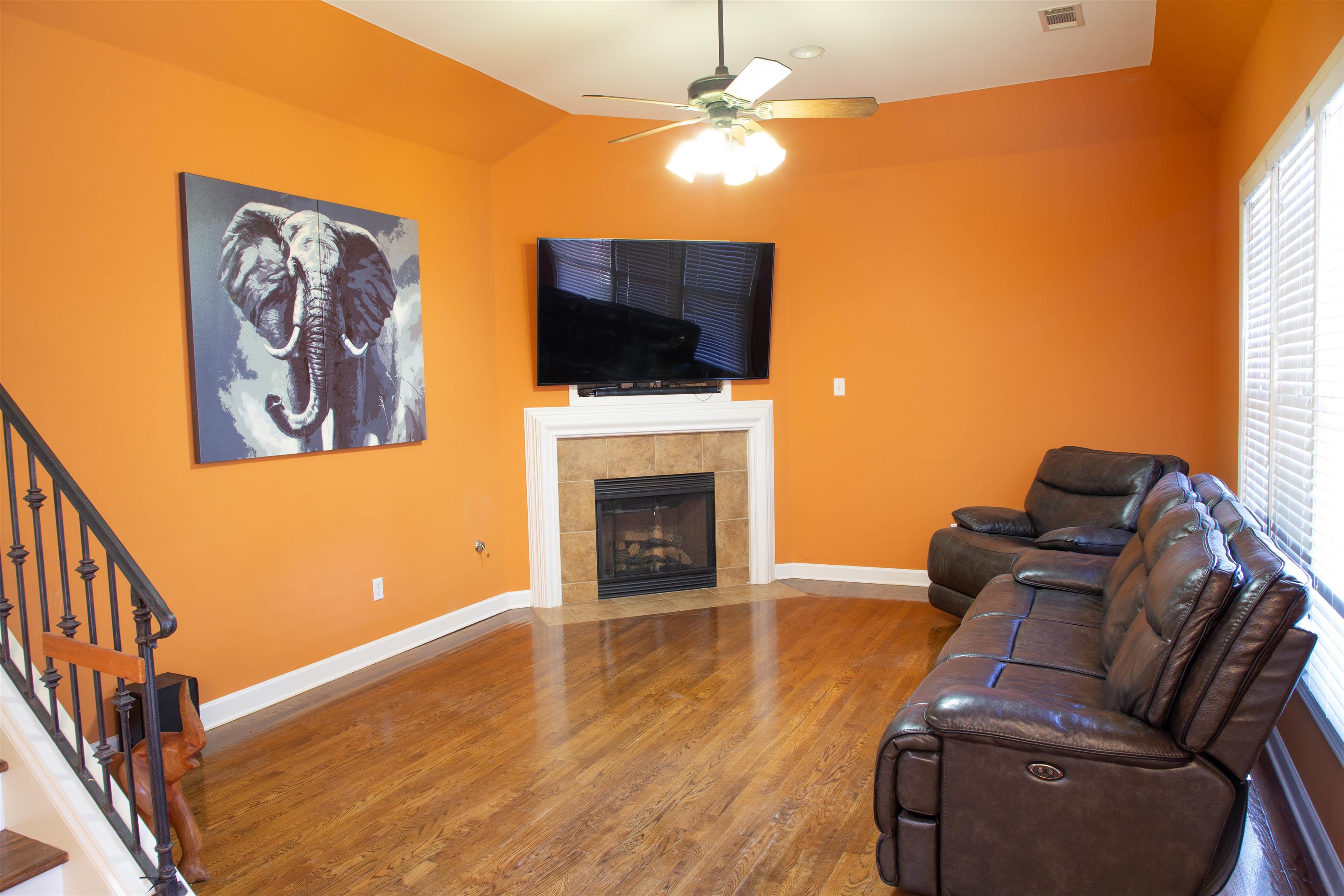 4868 Rainy Pass Road Collierville, TN 38017 - Photo 11 of 20 a living room with furniture or flat screen tv and a fireplace