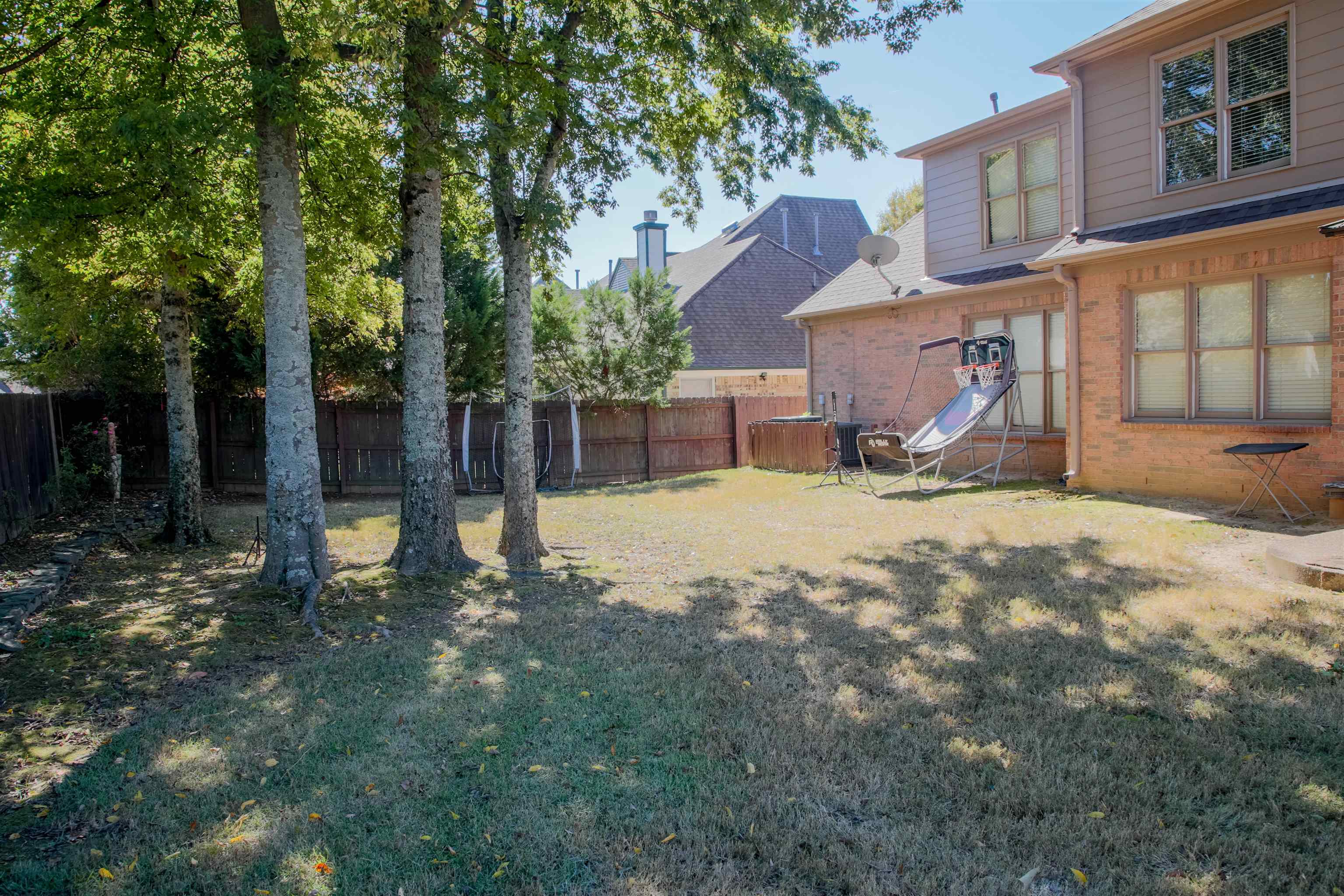 4868 Rainy Pass Road Collierville, TN 38017 - Photo 18 of 20 a view of a house with a yard