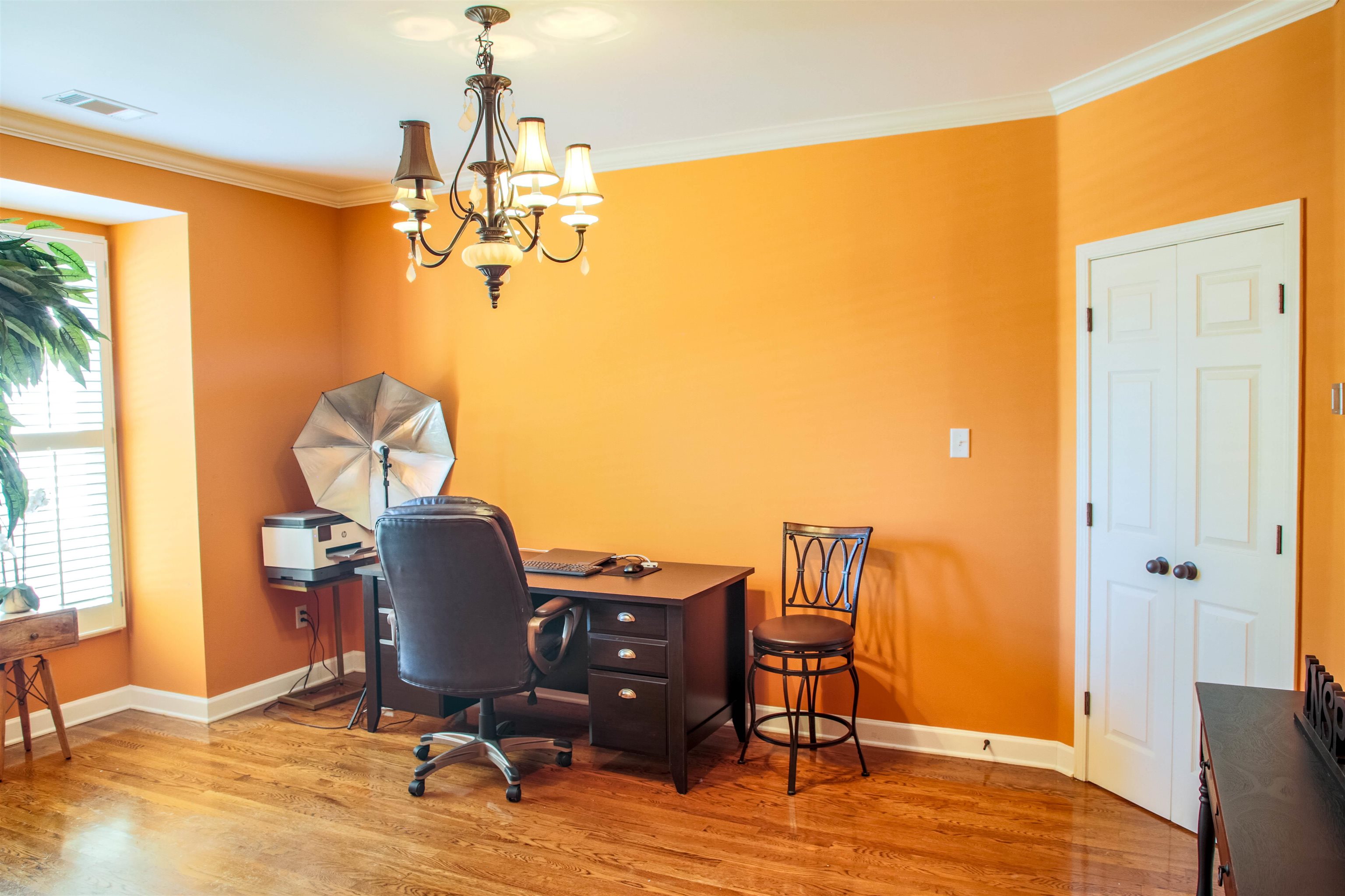 4868 Rainy Pass Road Collierville, TN 38017 - Photo 19 of 20 a view of a workspace with furniture and a window