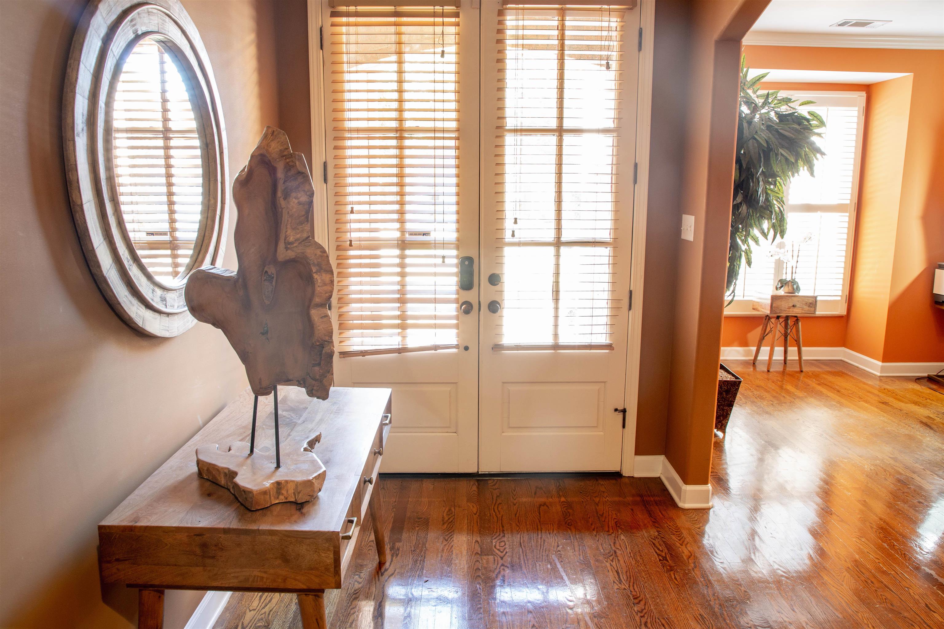4868 Rainy Pass Road Collierville, TN 38017 - Photo 2 of 20 a view of a livingroom with furniture wooden floor and a floor to ceiling window