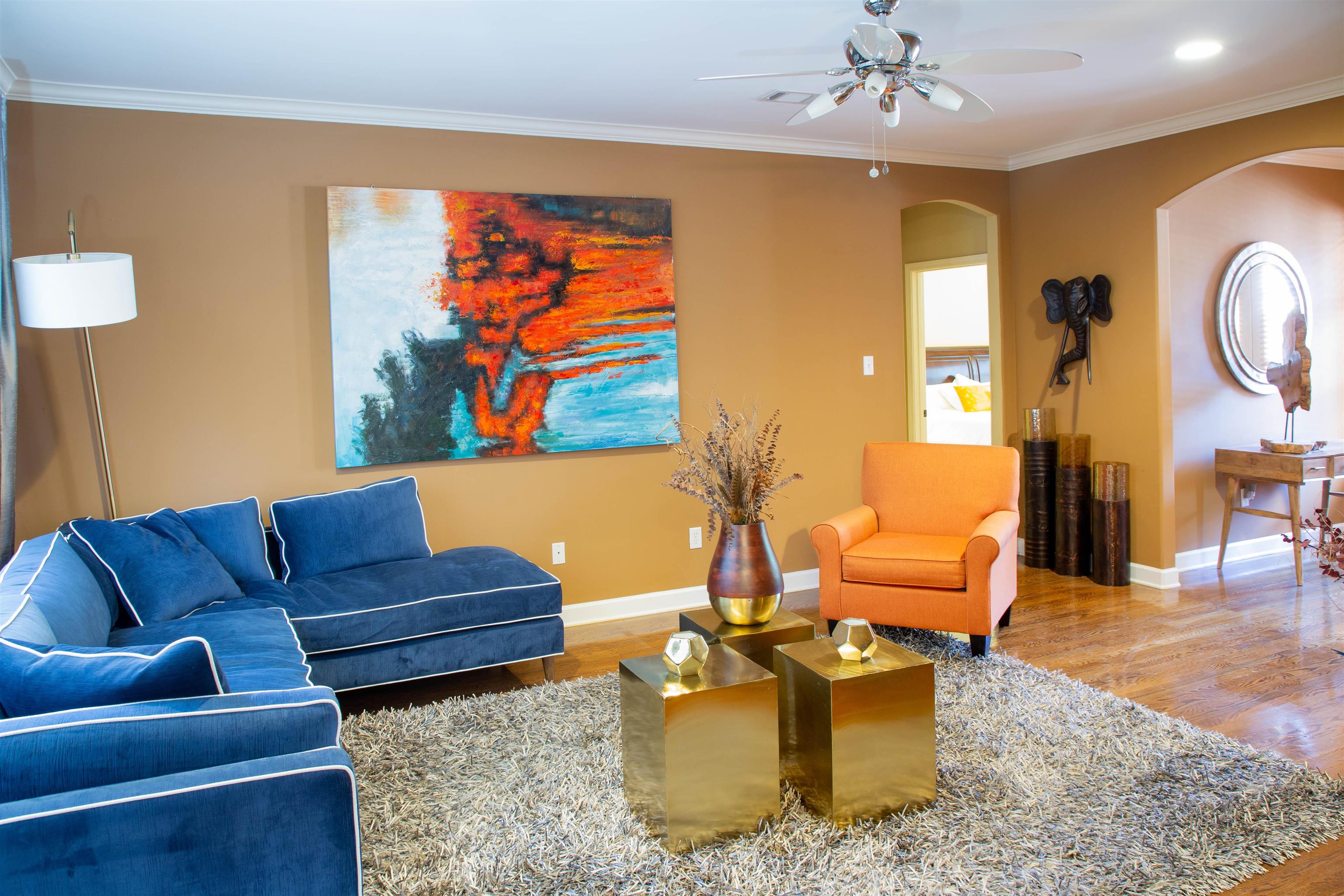 4868 Rainy Pass Road Collierville, TN 38017 - Photo 3 of 20 a living room with furniture a rug and a lamp
