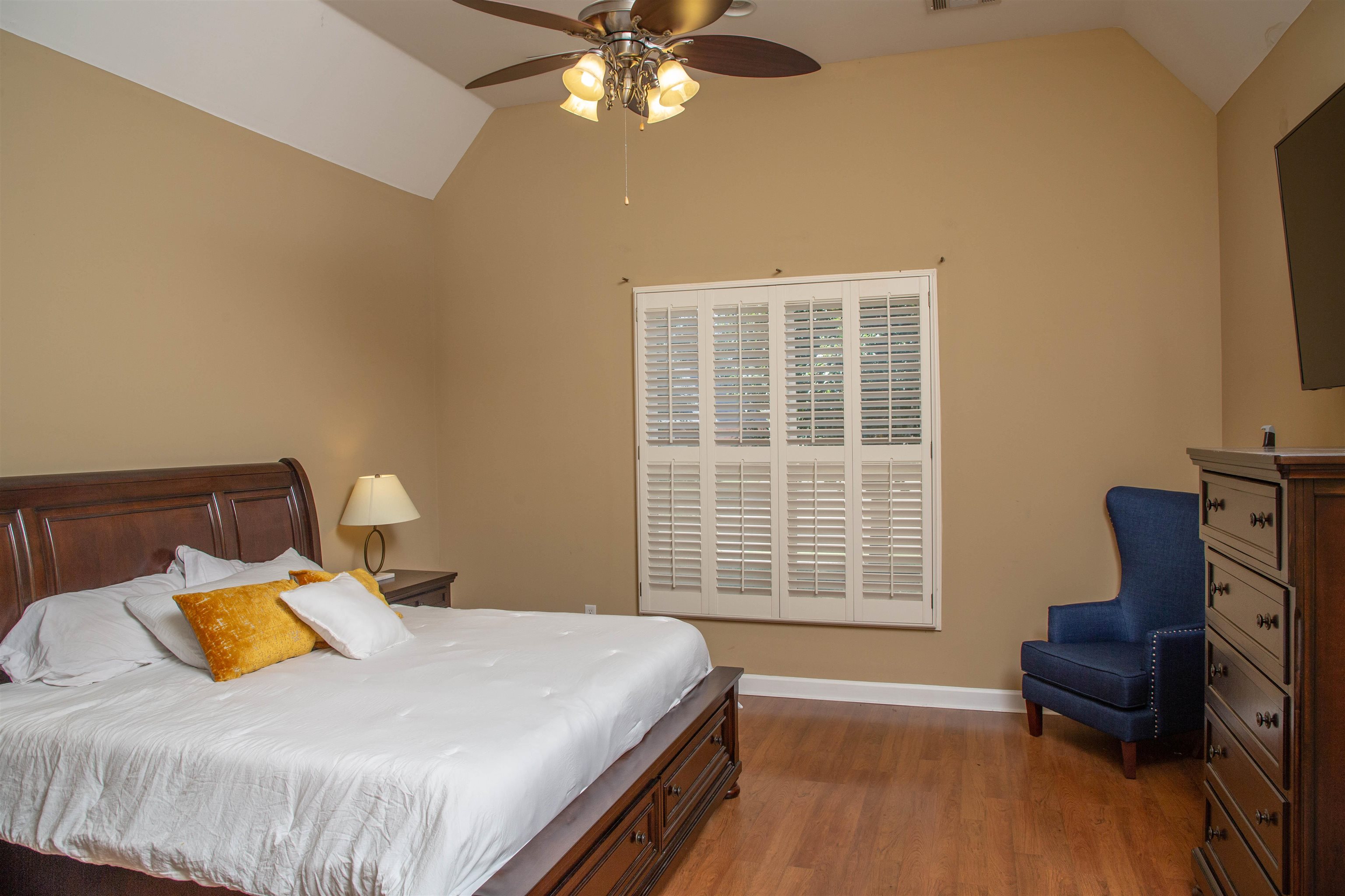 4868 Rainy Pass Road Collierville, TN 38017 - Photo 4 of 20 a bedroom with a bed and wooden floor