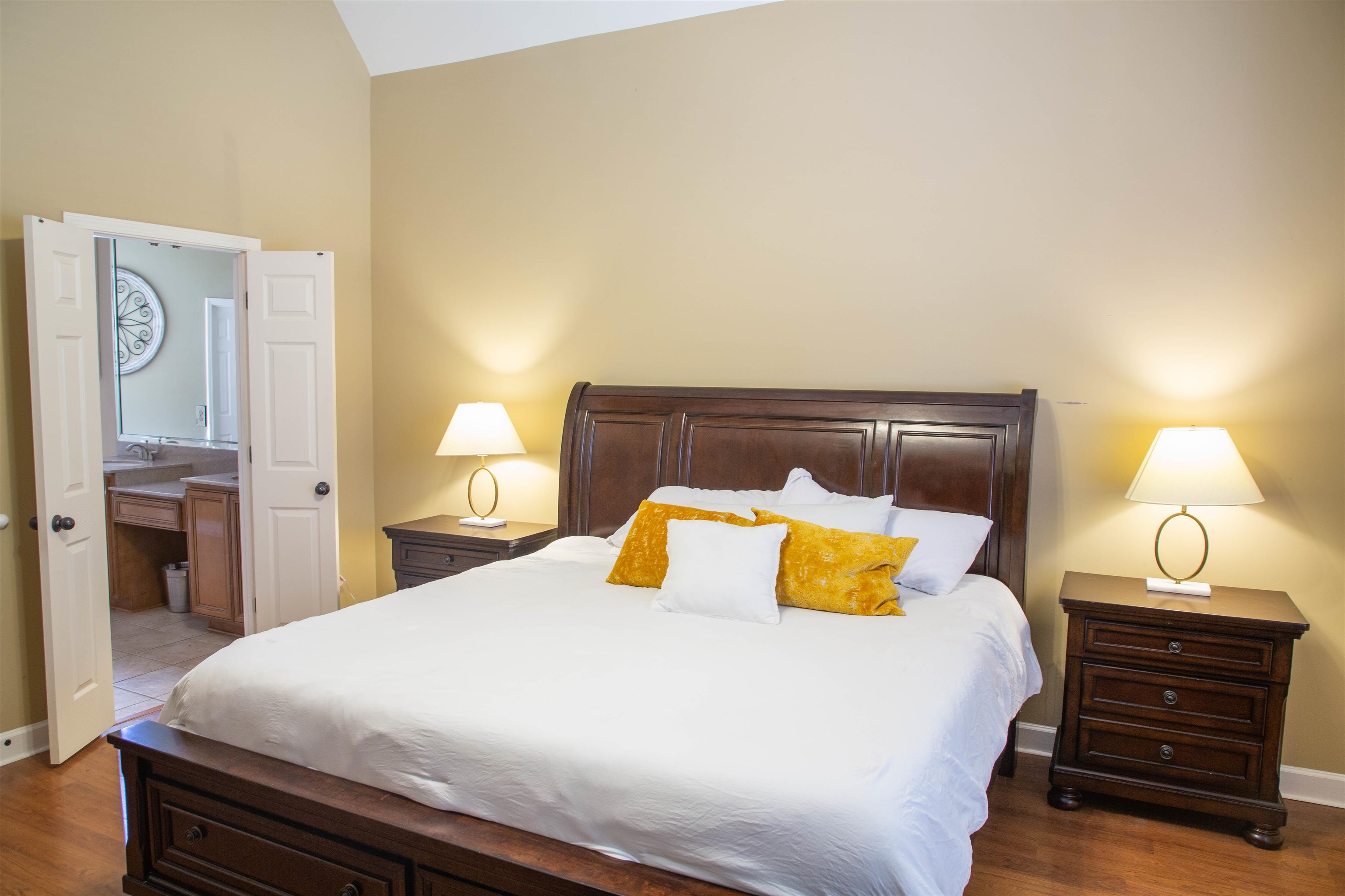 4868 Rainy Pass Road Collierville, TN 38017 - Photo 5 of 20 a bedroom with a bed and lamp