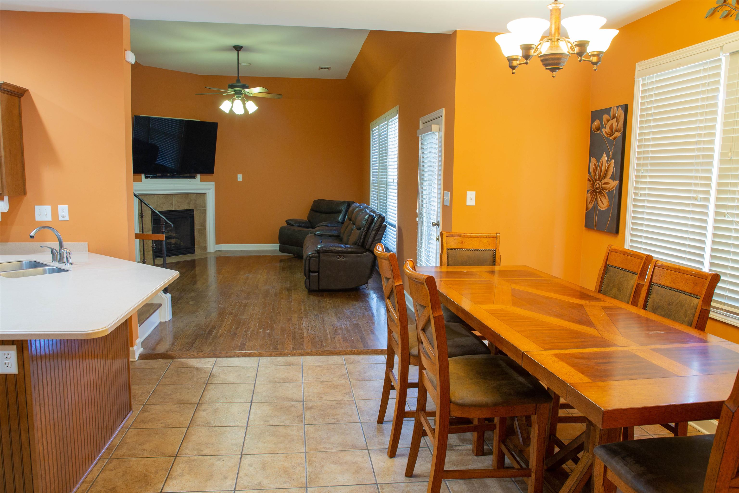 4868 Rainy Pass Road Collierville, TN 38017 - Photo 10 of 20 a living room with furniture a fireplace and a flat screen tv