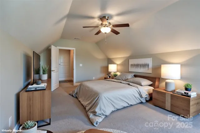 a view of an house with swimming pool and porch