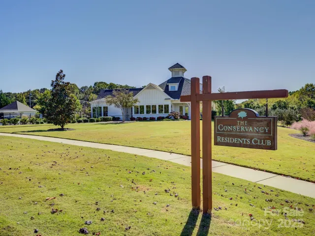 a view of house with outdoor space and river