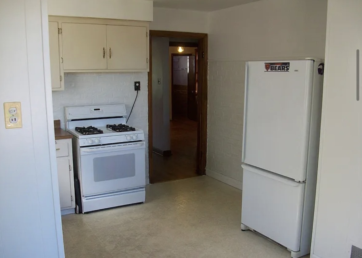2433 Keystone Avenue North Riverside, IL 60546 - Photo 3 of 13 a kitchen with white cabinets and white appliances