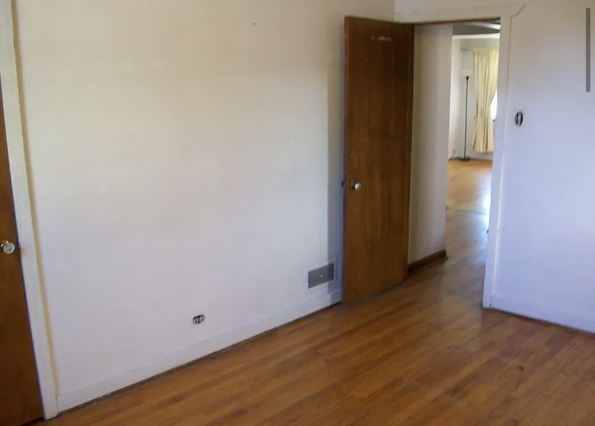 2433 Keystone Avenue North Riverside, IL 60546 - Photo 7 of 13 an empty room with wooden floor