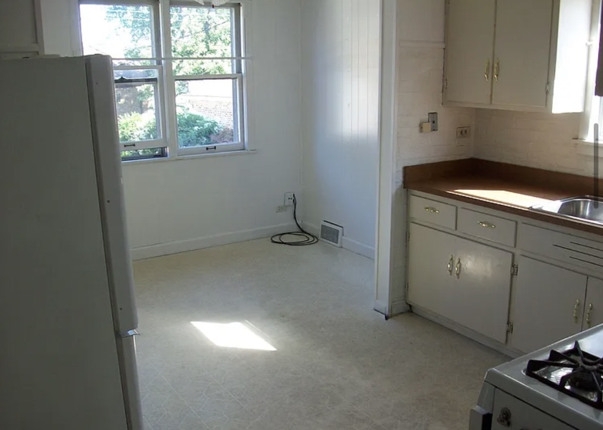 2433 Keystone Avenue North Riverside, IL 60546 - Photo 9 of 13 a kitchen with window and cabinets