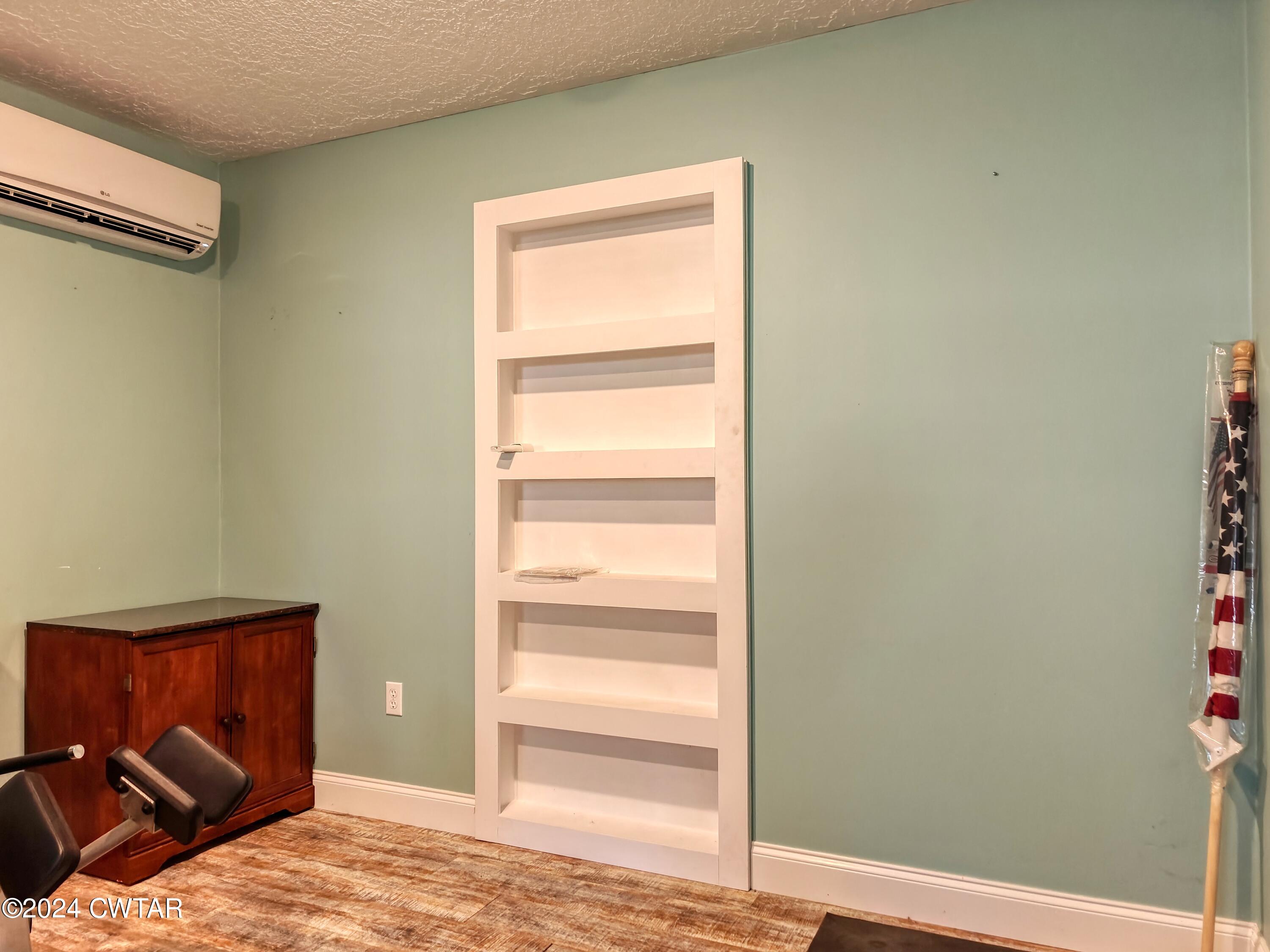 194 Mccadams Road McKenzie, TN 38201 - Photo 40 of 43 a bedroom with a bed and a window
