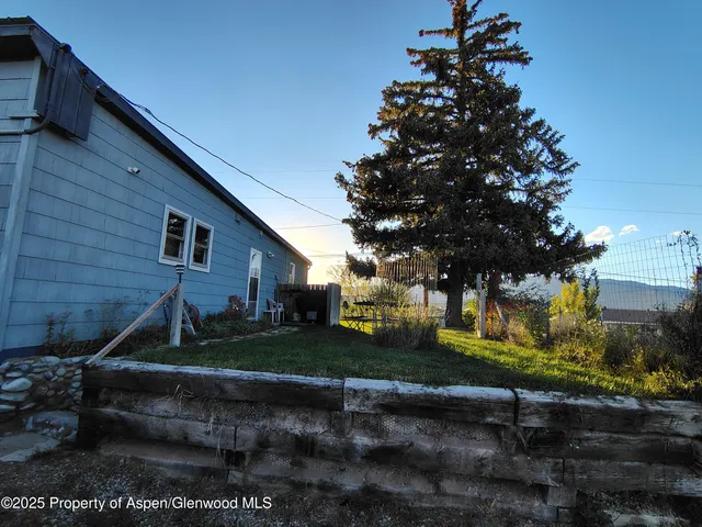 a view of a balcony with chairs