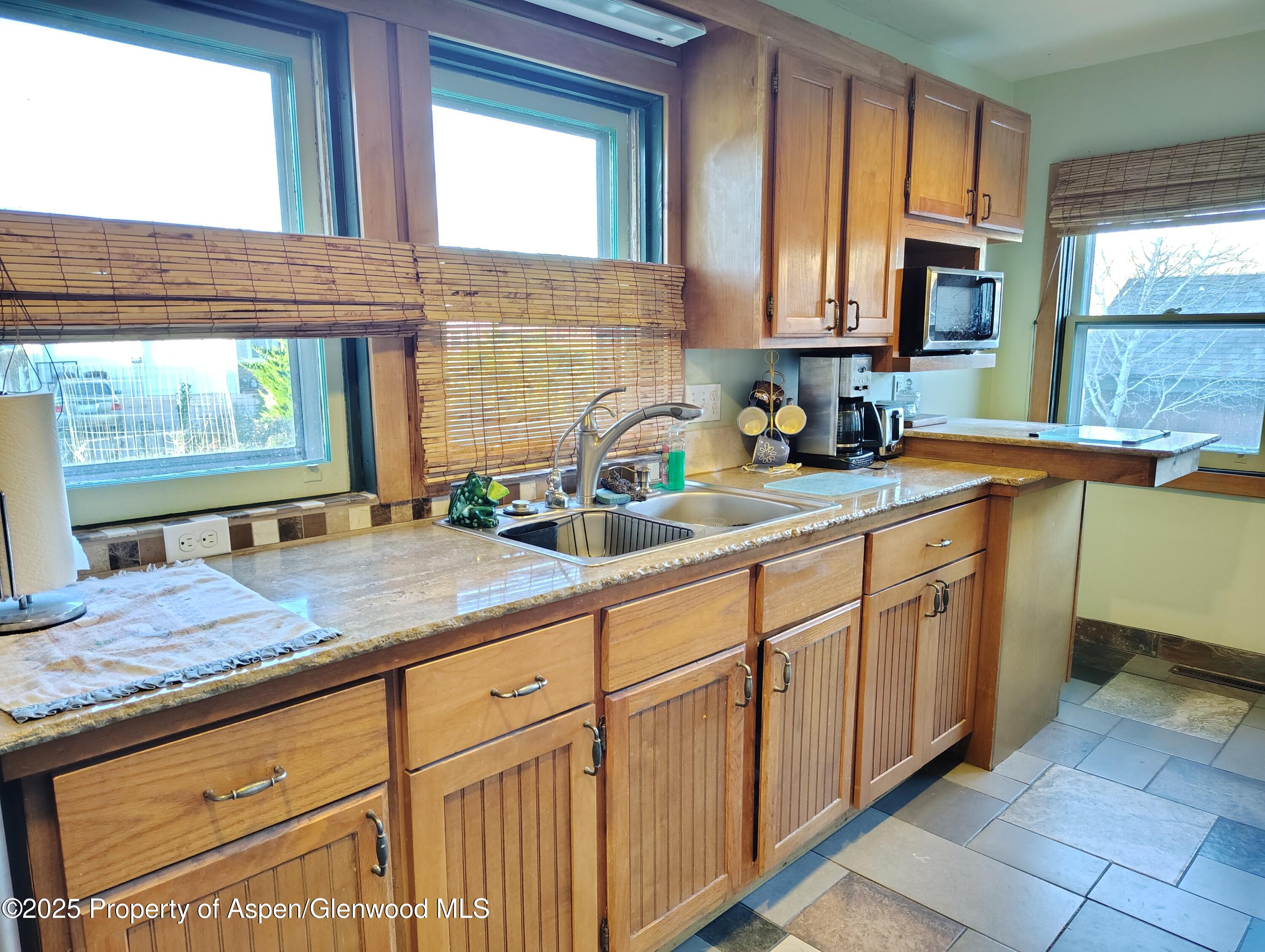 1036 Clarkson Avenue Rifle, CO 81650 - Photo 5 of 30 IMG_20251008_180816418_HDR