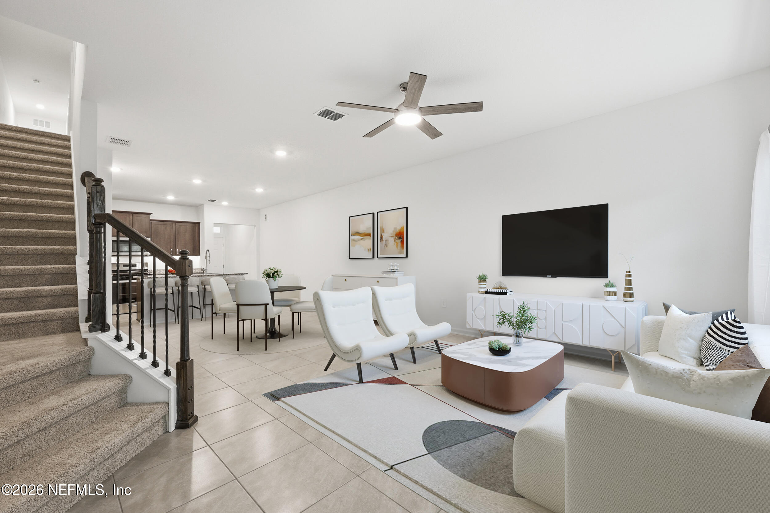 70 Barley Street St. Augustine, FL 32092 - Photo 17 of 40 a living room with furniture and a flat screen tv