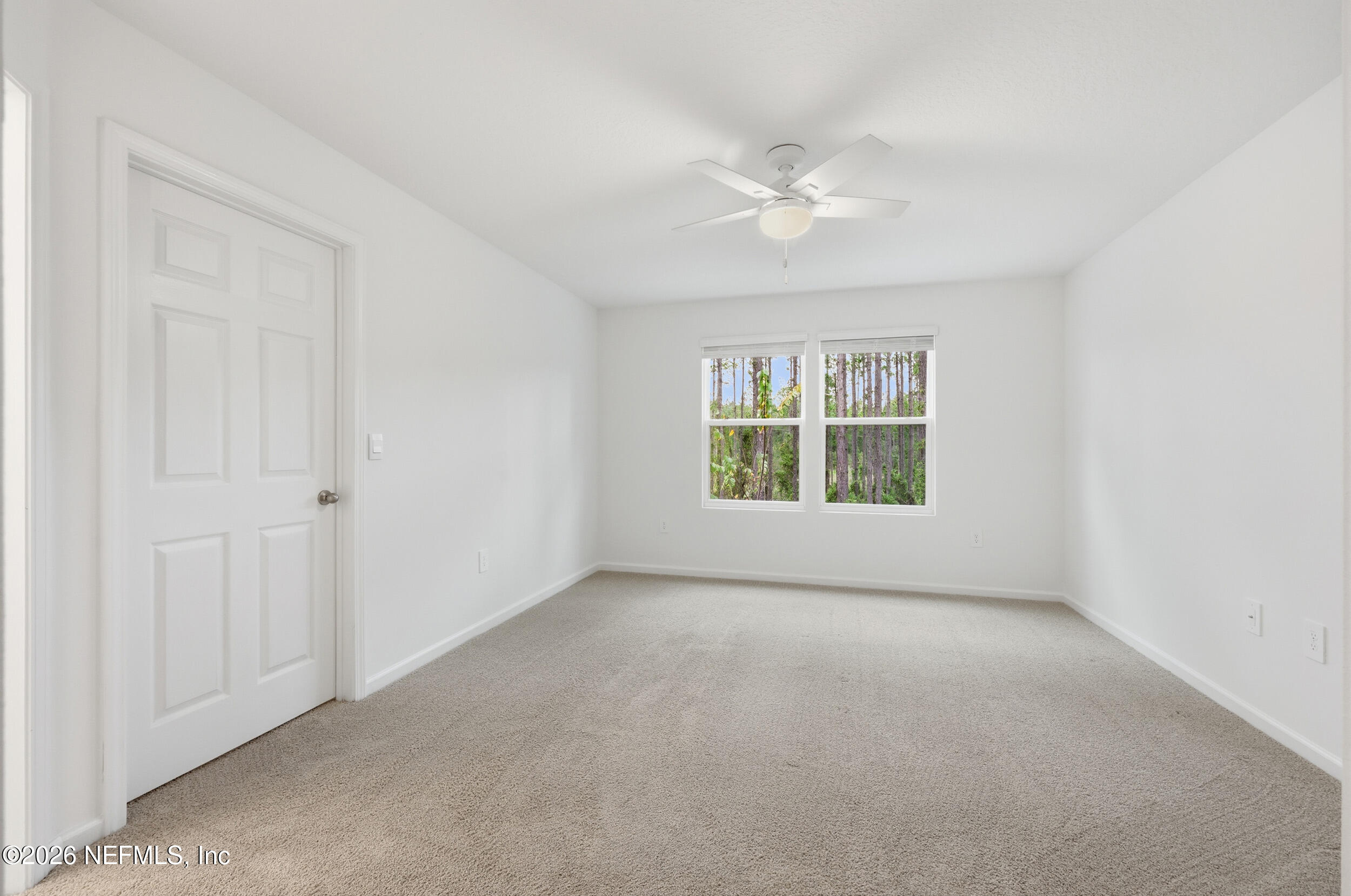 70 Barley Street St. Augustine, FL 32092 - Photo 20 of 40 a view of an empty room with a window