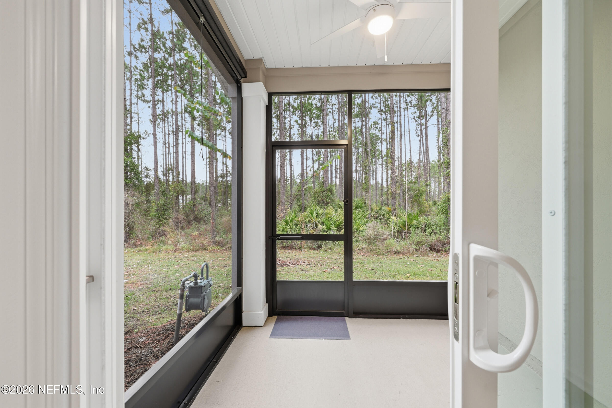 70 Barley Street St. Augustine, FL 32092 - Photo 31 of 40 a view of a room that has a large window and front door