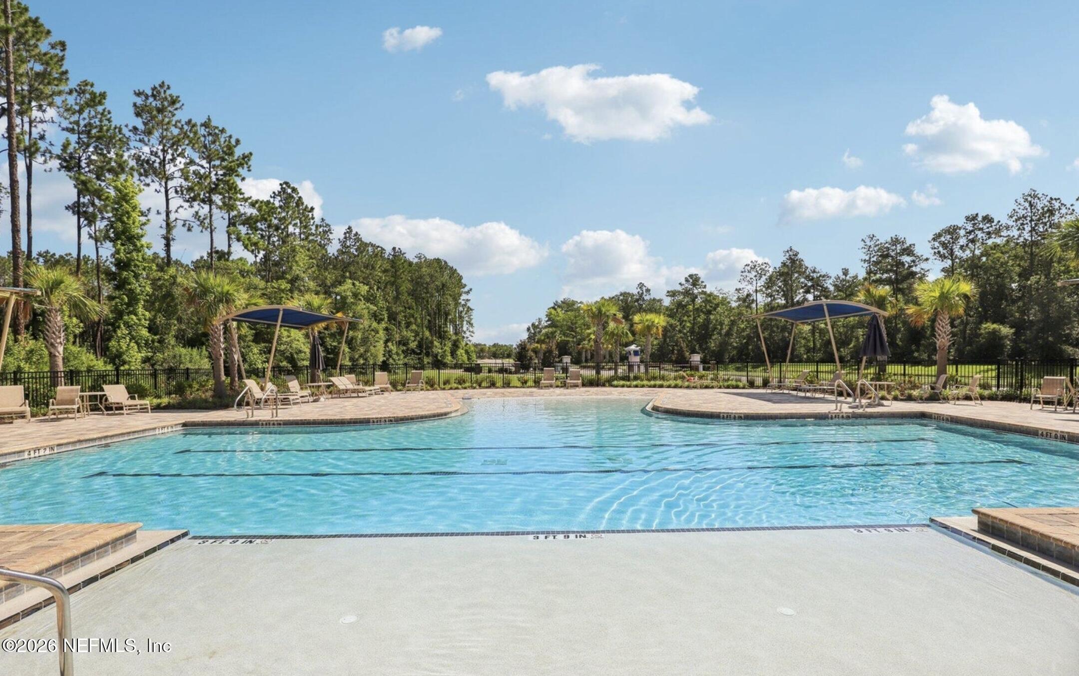 70 Barley Street St. Augustine, FL 32092 - Photo 37 of 40 a view of a house with a yard