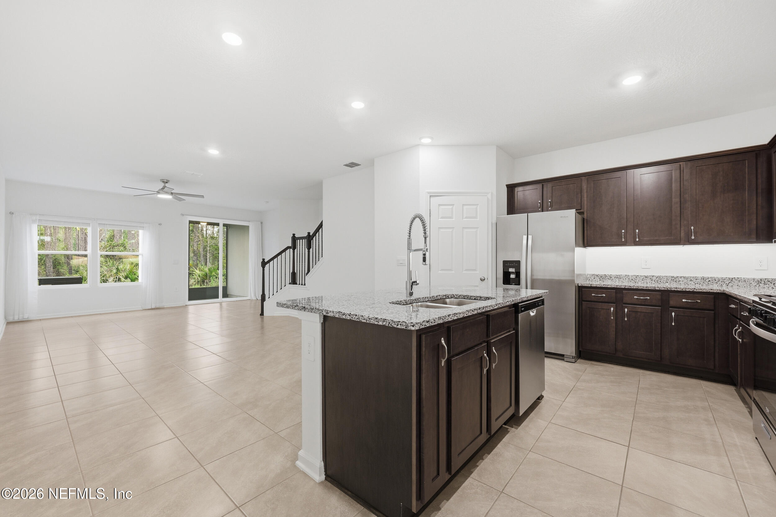 70 Barley Street St. Augustine, FL 32092 - Photo 5 of 40 a kitchen with a stove sink and cabinets