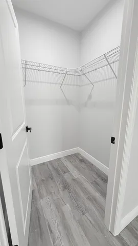 a view of a room with racks on the wall