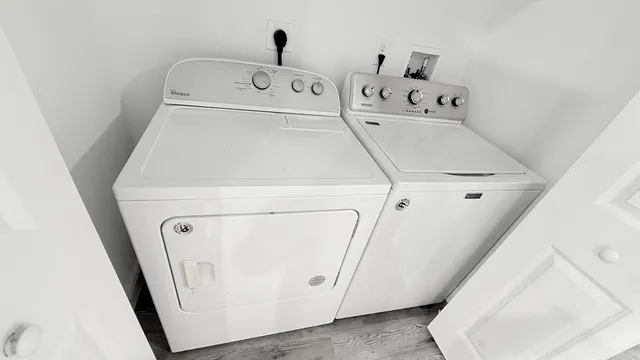 a utility room with dryer and washer