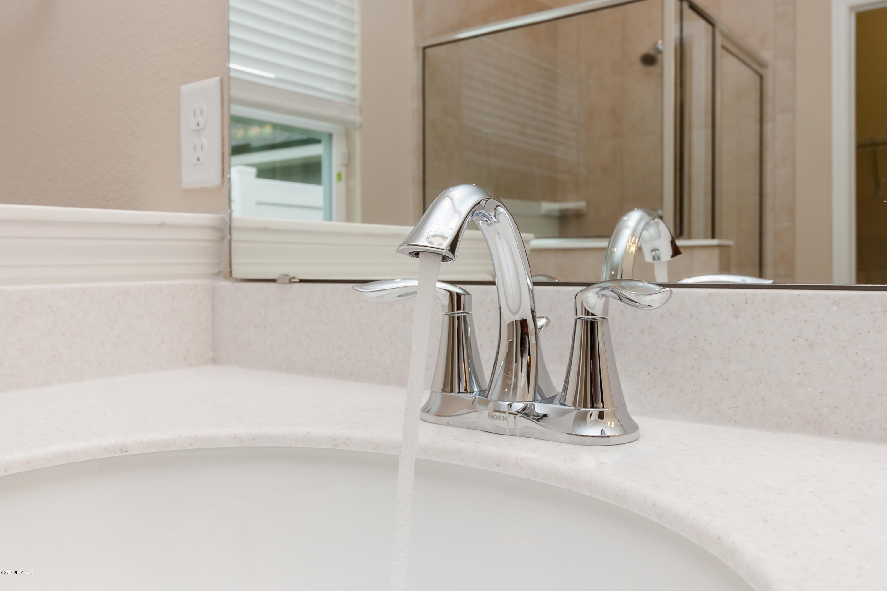 15714 Tisons Bluff Road Jacksonville, FL 32218 - Photo 29 of 44 a bathroom with a sink