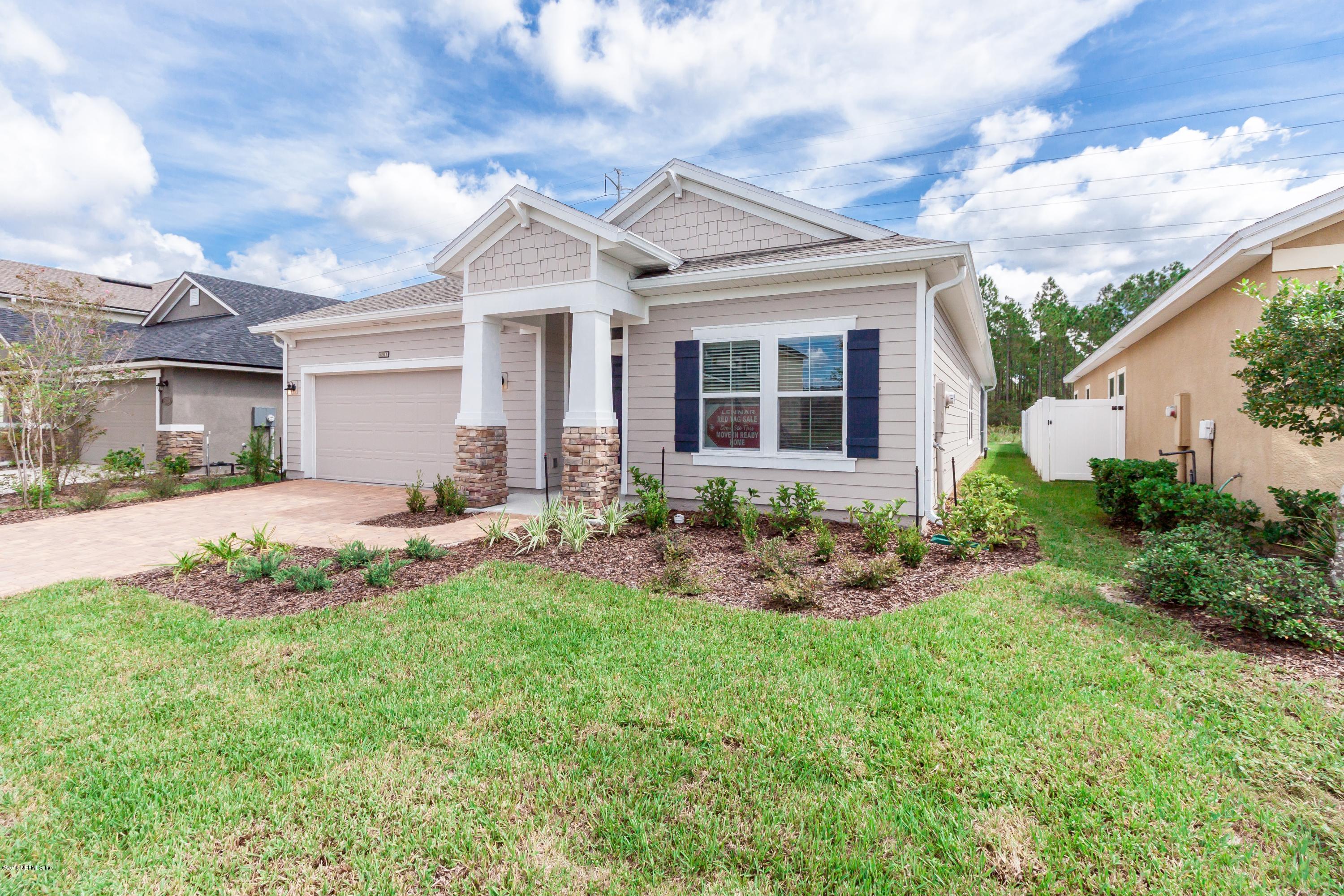 15714 Tisons Bluff Road Jacksonville, FL 32218 - Photo 4 of 44 a view of a house with backyard and garden