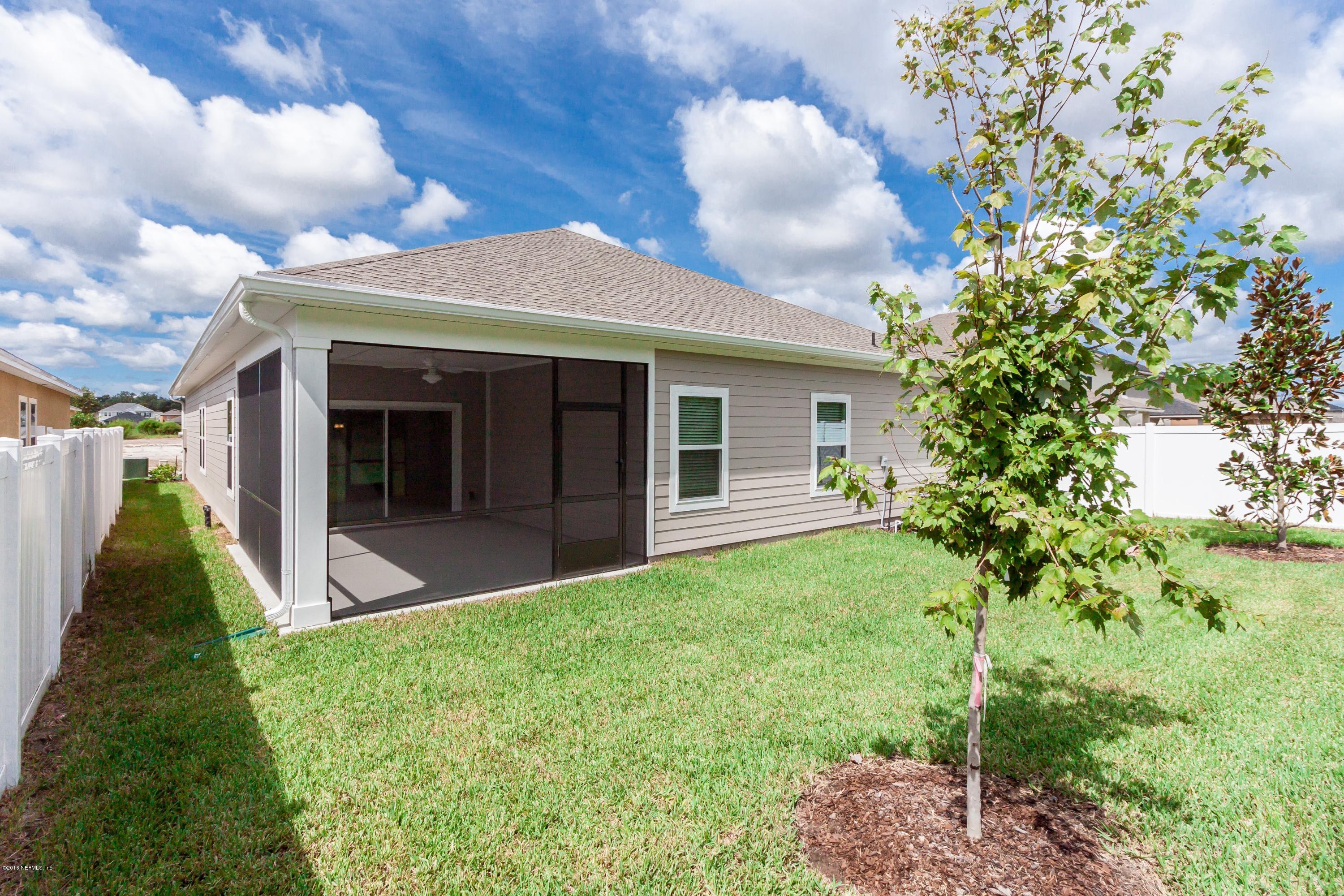 15714 Tisons Bluff Road Jacksonville, FL 32218 - Photo 42 of 44 a view of an house with backyard space and garden