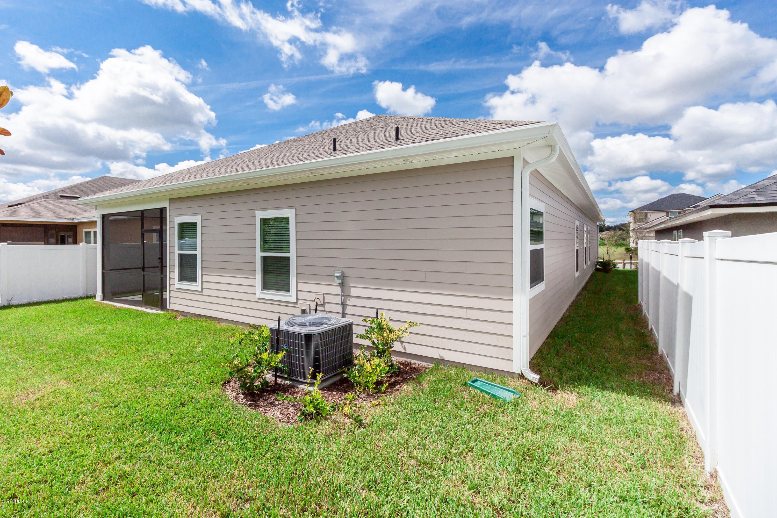 15714 Tisons Bluff Road Jacksonville, FL 32218 - Photo 44 of 44 a view of a house with a backyard