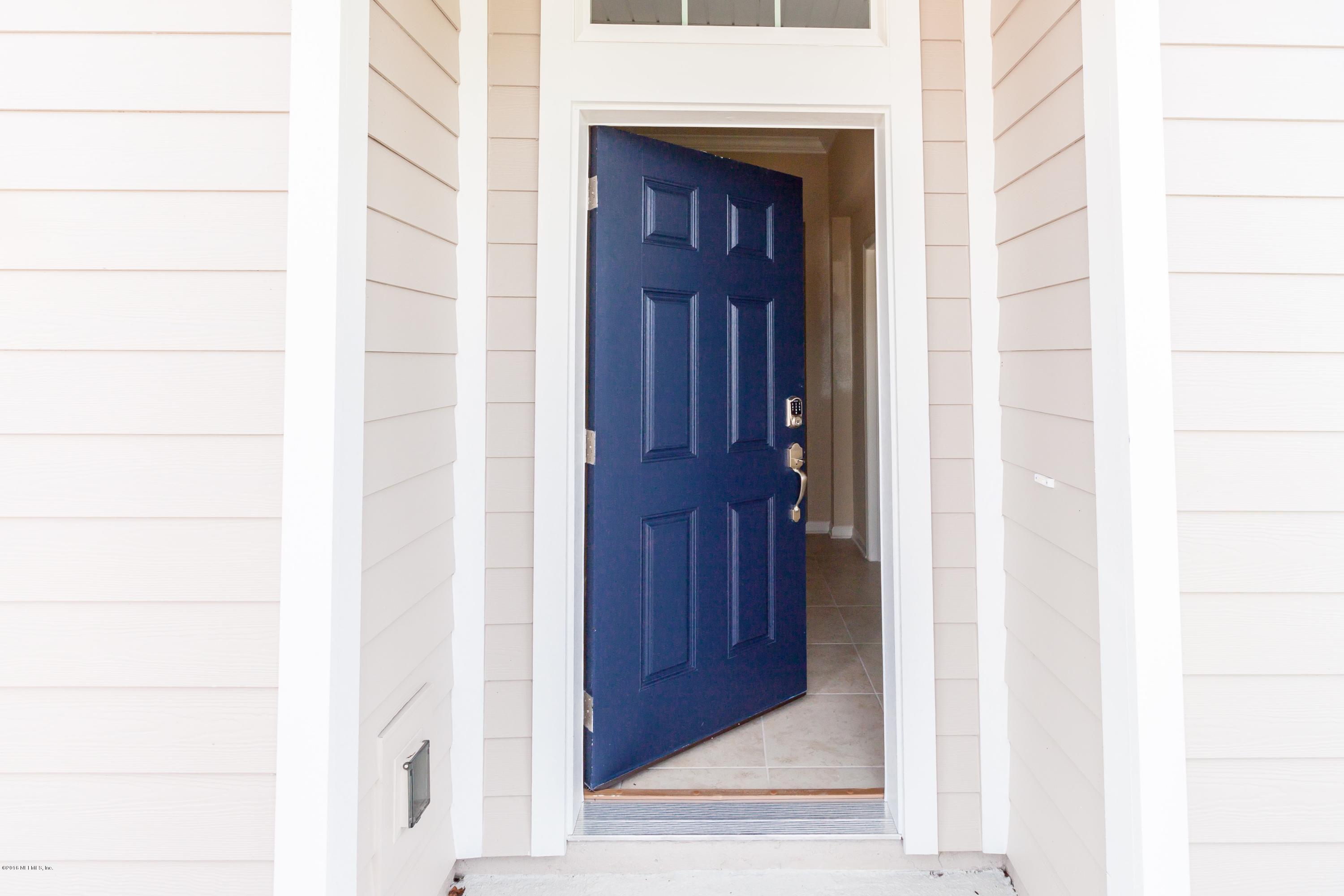 15714 Tisons Bluff Road Jacksonville, FL 32218 - Photo 6 of 44 a view of front door