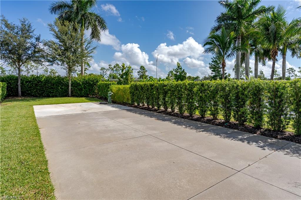 13611 Snook Circle Naples, FL 34114 - Photo 11 of 47 a view of a backyard of a house