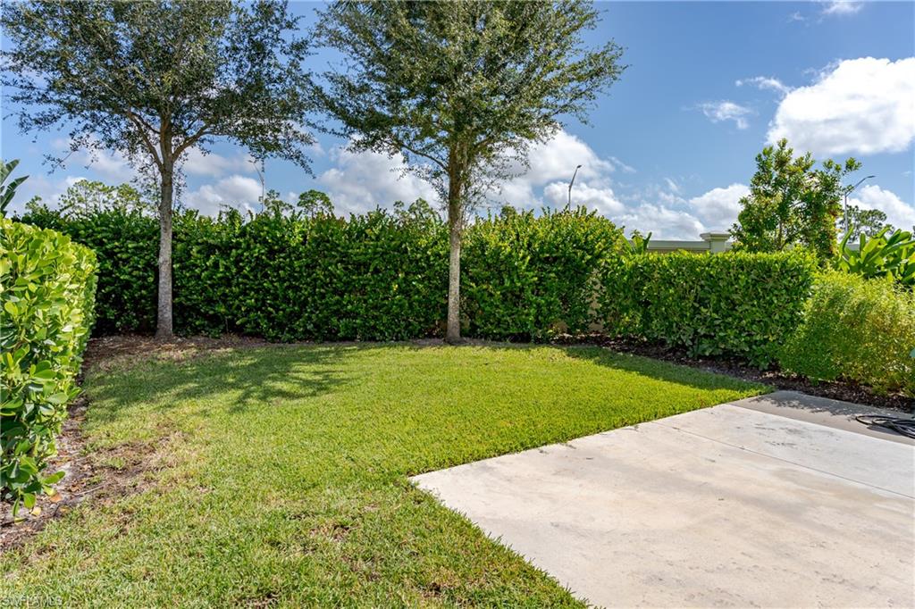 13611 Snook Circle Naples, FL 34114 - Photo 22 of 47 a view of a backyard
