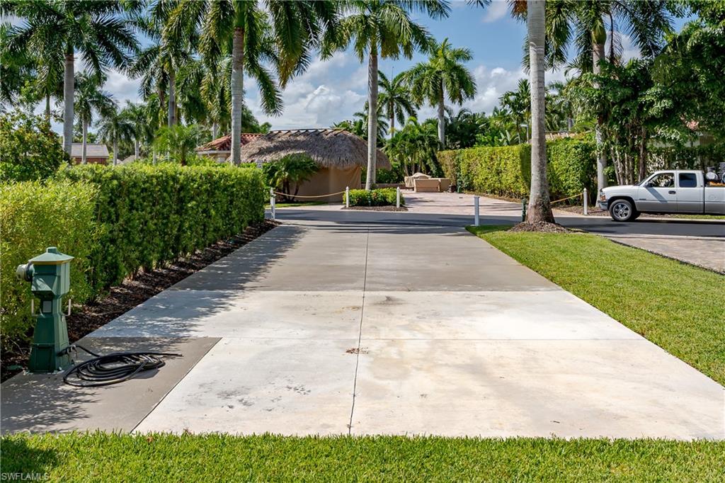 13611 Snook Circle Naples, FL 34114 - Photo 27 of 47 a view of a park with palm trees
