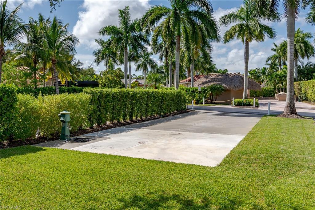 13611 Snook Circle Naples, FL 34114 - Photo 28 of 47 a view of a backyard