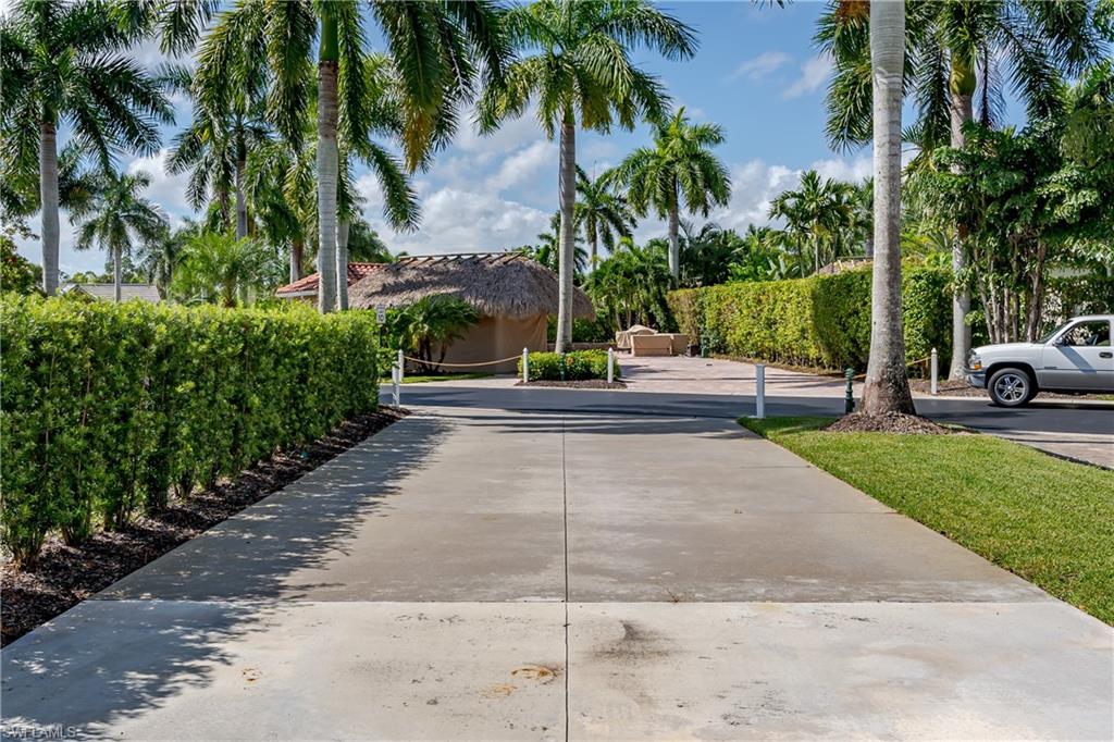 13611 Snook Circle Naples, FL 34114 - Photo 32 of 47 a view of a park with palm trees
