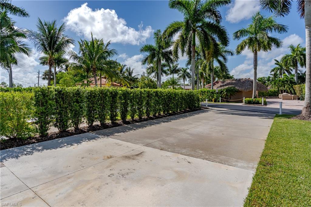 13611 Snook Circle Naples, FL 34114 - Photo 33 of 47 a view of a garden
