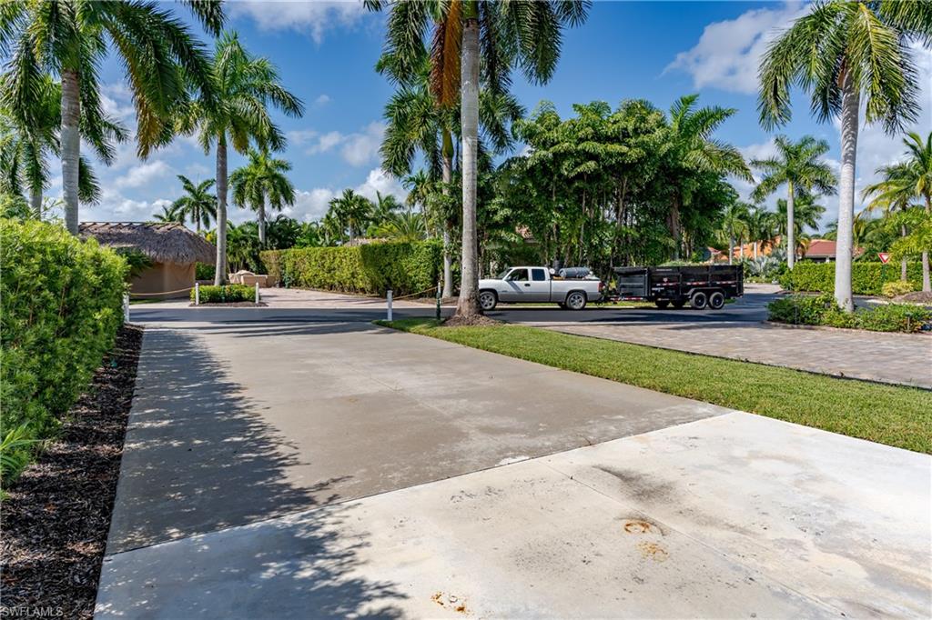 13611 Snook Circle Naples, FL 34114 - Photo 35 of 47 a view of a park with palm trees