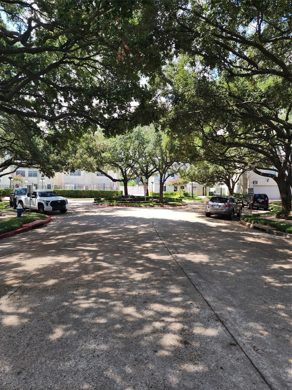 7399 Regency Square Court, Unit 7399 Houston, TX 77036 - Photo 27 of 27 a view of street with parked cars