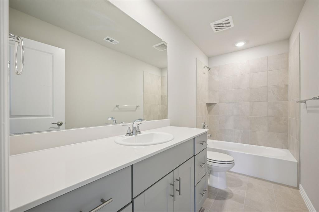 1628 Arches Road Anna, TX 75409 - Photo 26 of 28 Photo is not of the actual home, but is an inspirational photo of builder’s model home and may depict options, furnishings, and/or decorator features that are not included.